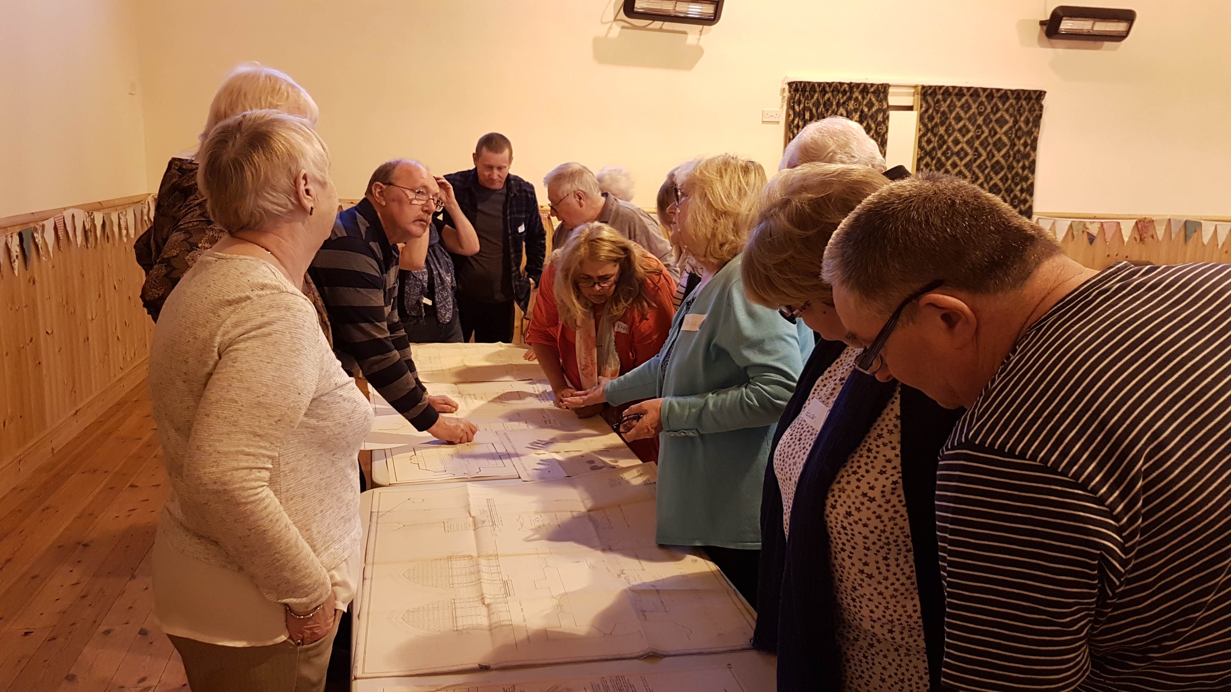Volunteers with plan